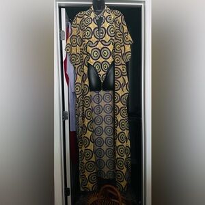 Swimsuit Edition: Ofuure:
1 Piece Swimsuit w/Sheer Coverup, & headwrap.